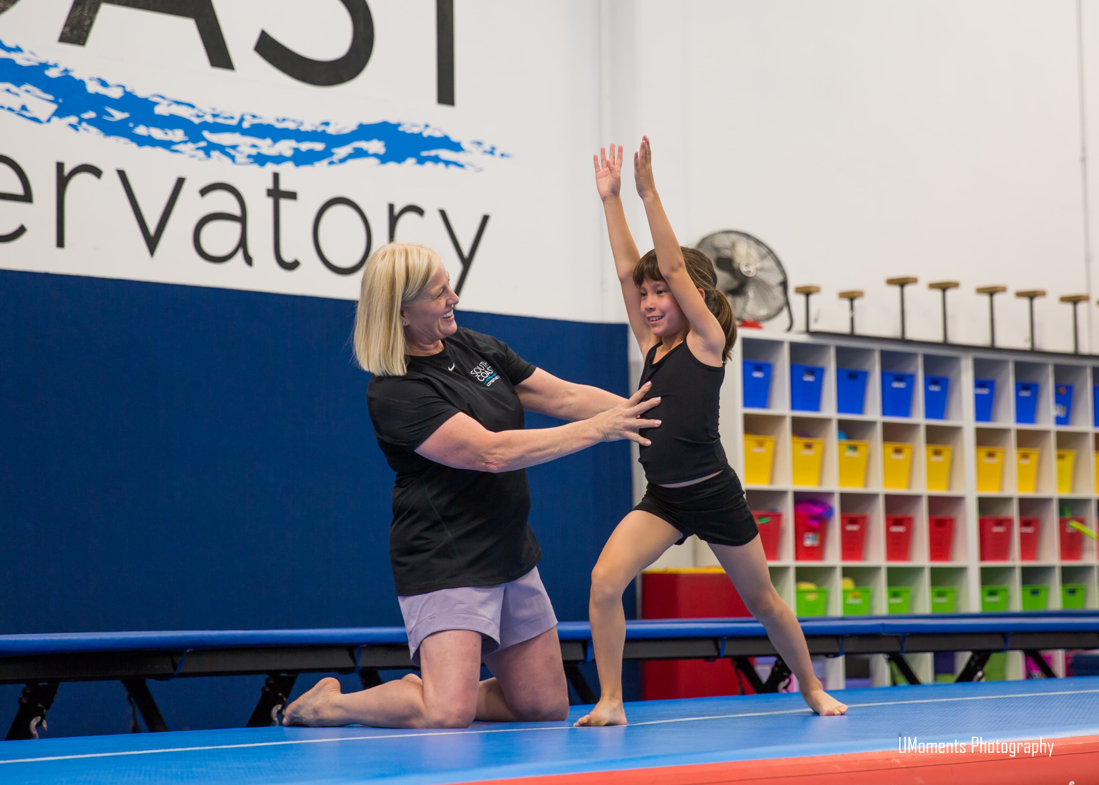 Young acro students learning basics