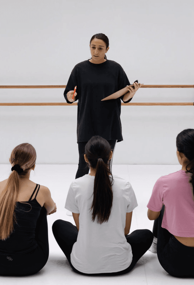 Students learning choreography and teaching techniques